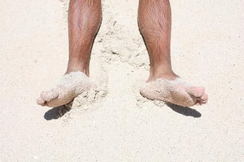 Sandy feet Stock Photos