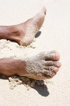 Sandy feet Stock Photos