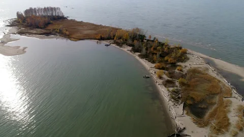 Sandy island on the river. Video stock 141774795