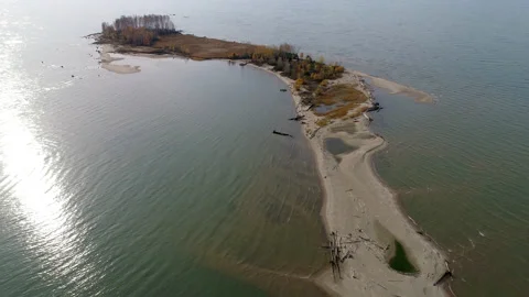 Sandy island on the river. Video stock 141774872