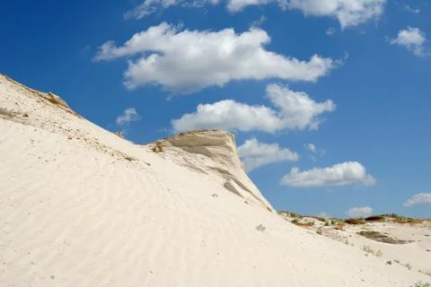 Sandy mountain from white sand Stock Photos
