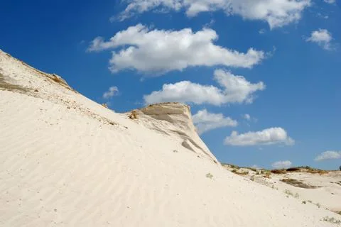 Sandy mountain from white sand Stock Photos