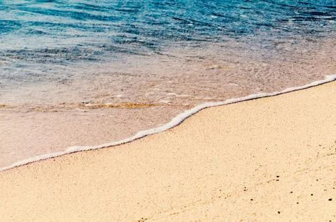 Sandy ocean beach, soft focus. Tropical photo background. Seascape abstract. Stock Photos