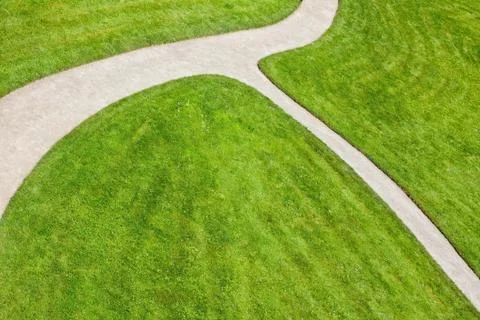 Sandy path - pavement and grass Stock Photos