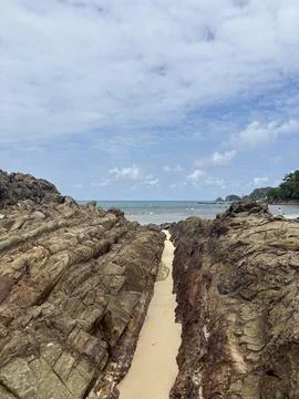 Sandy Path Through Rocky Beach Landscape in Kuala Terengganu Stock Photos