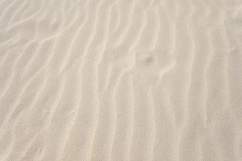 Sandy patterns created by the wind from the sand on the beach Foto stock
