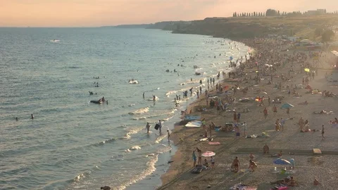 Sandy sea beach and people. Stock Footage