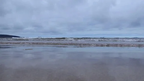 Sandy shore and waves of the ocean. Stock Footage 80526981
