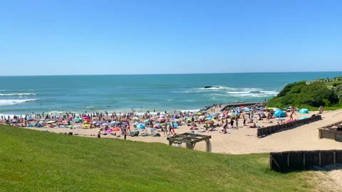 Sandy shore at Plage de Milady with many tourists on the sand 库存影片 340151674