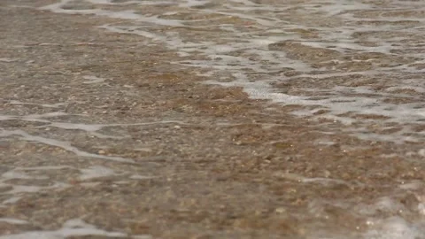 Sandy shore with small waves approaching, Stock Footage 342258900