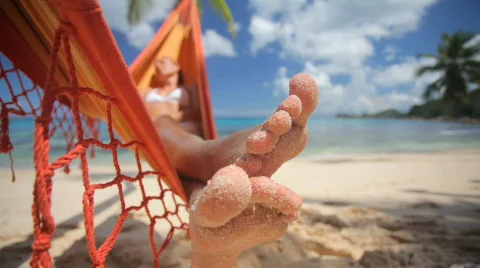 Sandy toes in changing light Stock Footage 473493