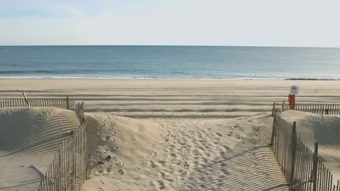 Sandy walkway path to ocean front Video stock 75174121
