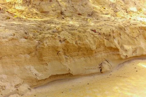 Sandy wall on the beach Stock Photos