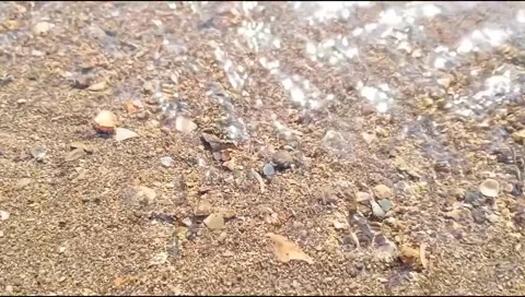 The sandy water flow on the beach is beautiful, unique and rare Stock Footage 277812536