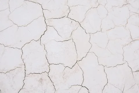 Sandy white cracks on surface texture Stock Photos