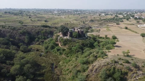 Sangni Fort between forest and village built as Mughal outpost Stock Footage 320063531