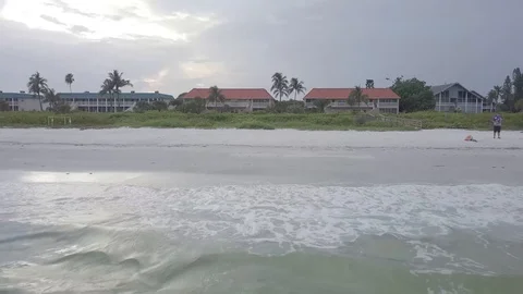 Sanibel Beach to Condo Stock Footage 92039347