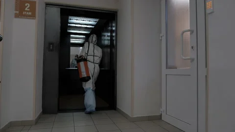 Sanitary spraying the elevator in the building Stock-Footage 131461335