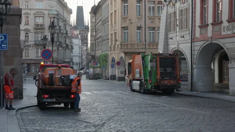 Sanitation Workers In Orange Vests Collect Trash With Trucks On Prague Street Stock-Footage 342279018