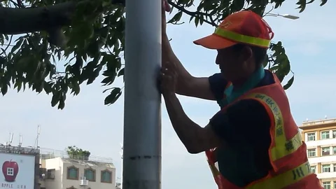 Sanitation workers in the wire rod to remove stains and then paint Stock Footage 69822219
