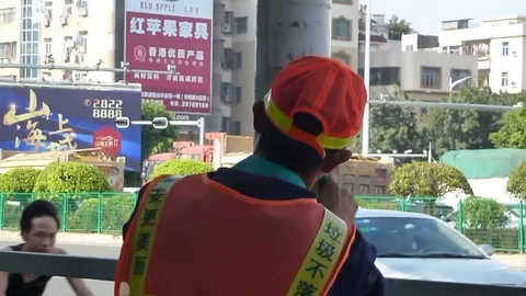 Sanitation workers in the wire rod to remove stains and then paint Stock Footage 69822916