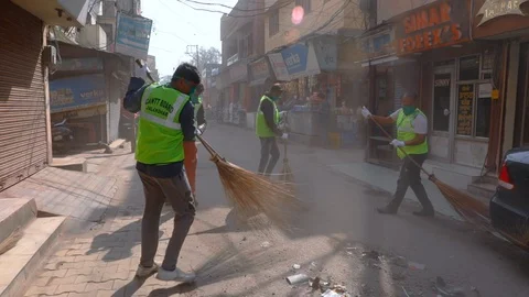 Sanitization of streets due to Coronavirus or Covid-19. Stock Footage 128122812