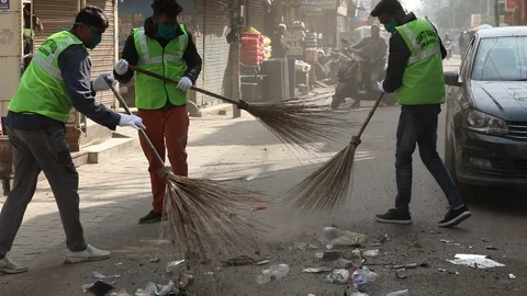 Sanitization of streets due to Coronavirus or Covid-19. Stock Footage 128122994