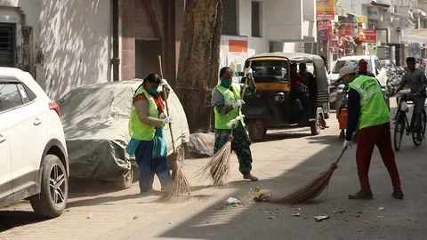 Sanitization of streets due to Coronavirus or Covid-19. Stock Footage 128123154