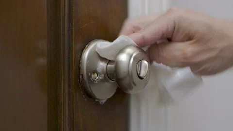 Sanitizing Door Knob Handle Close Up Stock Footage 127931283
