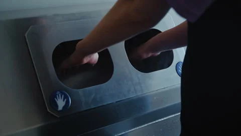 Sanitizing Hands Before Greenhouse Entry Stock-Footage 313535317