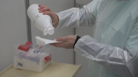 Sanitizing plastic mask Stock Footage 136199369