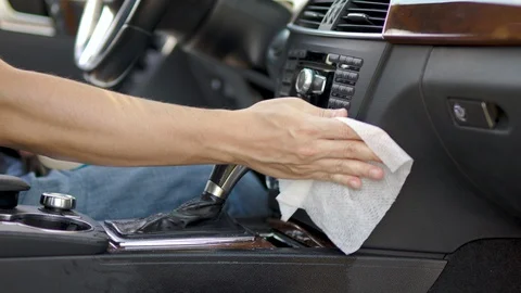 Sanitizing Vehicle Interior with Wipes Stock Footage 127931037