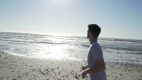 Santa Barbara Man running on Beach Slow Motion HD 動画素材 83177622
