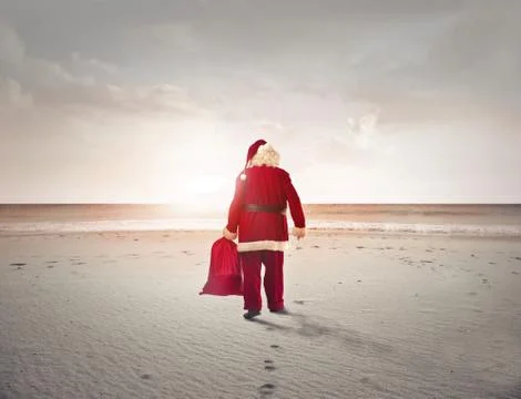 Santa on the beach Stock Photos