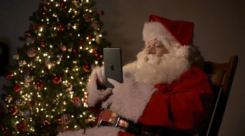 Santa black tablet Stock Footage 31621311