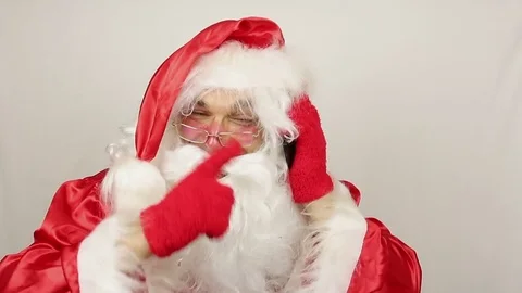 Santa calls by mobile phone Stock Footage 80353714
