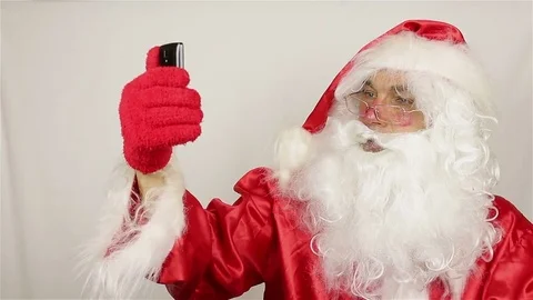 Santa calls by mobile phone Stock-Footage 80354377