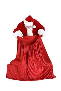 Santa: checking the gifts in the sack Stock Photos