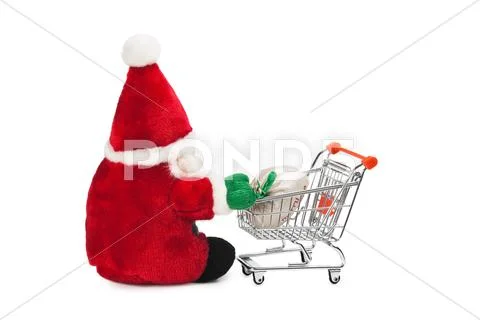 Santa claus and shopping cart isolated Stock Photos