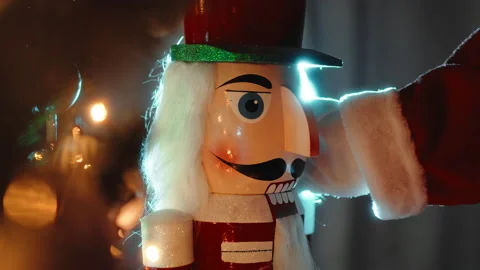 Santa Claus Caresses Nutcracker unde tree 스톡 동영상 221034334