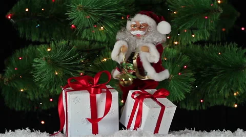 Santa Claus is dancing on a background  blinking garlands Stock Footage 56629719