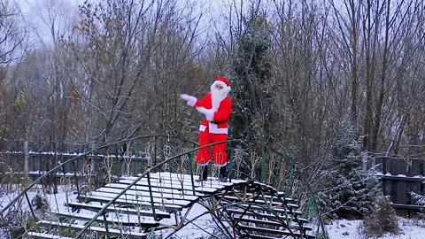 Santa Claus is dancing camera movement forward Stock Footage 165898315