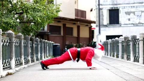 Santa claus doing push-ups Stock Footage 118249638
