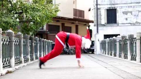 Santa claus doing push-ups Stock Footage 118249690