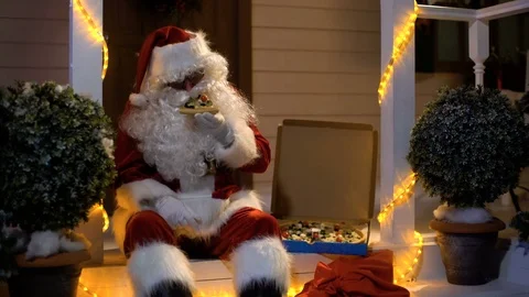 Santa claus eats pizza Video stock 83058605