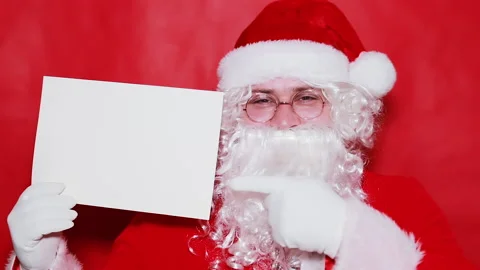Santa Claus with a form Stock Footage 165933581