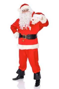 Santa Claus gesticulate while standing straight, isolated over white background Stock Photos