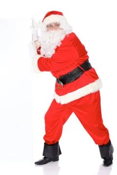 Santa Claus gesticulate while standing straight, isolated over white background Stock Photos