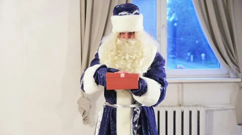 Santa claus with gift box Stock Footage 12247290