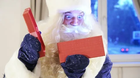 Santa claus with gift box Stock Footage 12247291